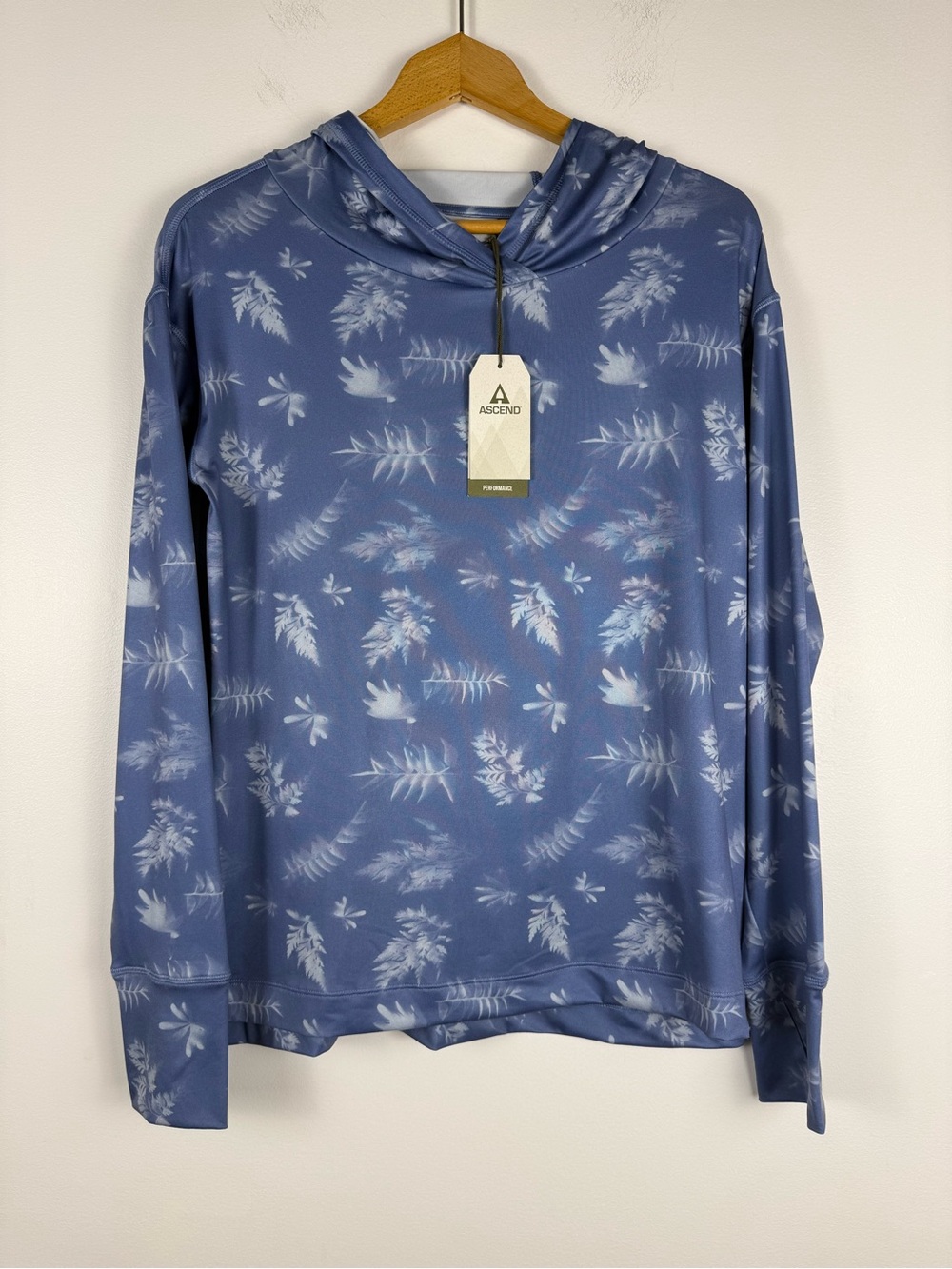 Ascend Women’s Blue Leaf Patterned Hooded Performance Top